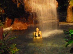 Enjoying one of the many falls (also hoping it washes my hair at the same time)